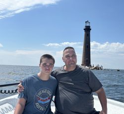 Couple enjoying fishing trip in Gulf Shores