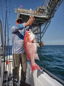 Lone angler fishing in Gulf Shores