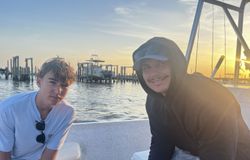 Two people enjoying fishing in Gulf Shores