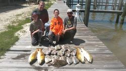 4 people fishing in Gulf Shores