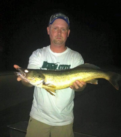 Angler with a 25-inch fish in MI