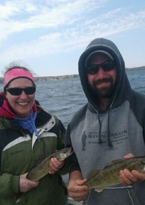 Two people fishing in Michigan