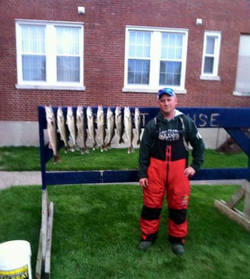 Angler fishing in Muskegon