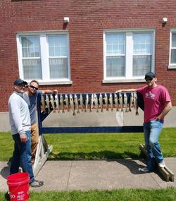 Three anglers fishing in Muskegon