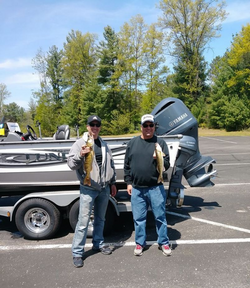 Two people fishing in Muskegon