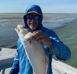 A person fishing in TX