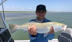 Fisherman with a large fish caught in TX