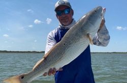 Angler with a 29-inch fish in Texas