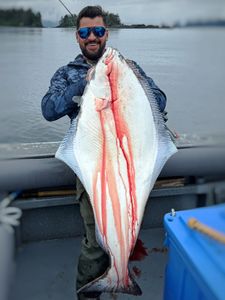 Large Pacific halibut catch displayed on fishing charter boat in Stuart FL