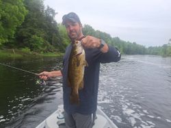 One fishing rod catching a fish in MI
