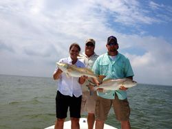 Two redfish, 24 inches long, caught in San Leon