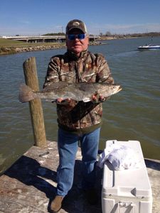 Angler fishing in Texas with a 24-inch catch