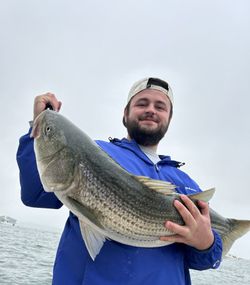 A person fishing in MA