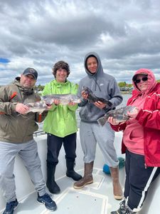 2 people fishing in MA