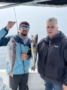 Two anglers fishing in MA