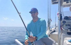 Person enjoying cruises, fishing, and tours in Barnstable