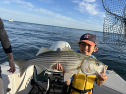 Nice striped bass from Barnstable Harbor on a clear day!