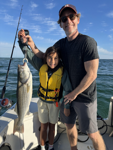 Nice striped bass using jigging techniques in clear conditions at Barnstable Harbor!