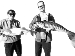 Huge Striped Bass double-header in Barnstable Harbor!