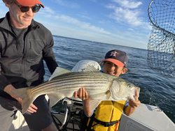 Nice striped bass caught using deep sea jigging in clear conditions off Barnstable!