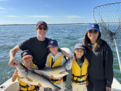 Nice striped bass on the boat today! Clear conditions made for great fishing.