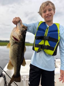 Young angler lands a big largemouth bass!