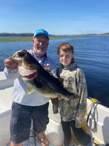 An angler fishing in Interlachen with a 22-inch catch