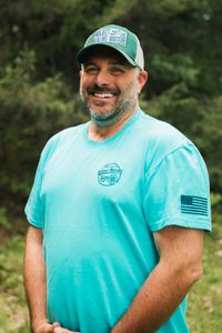Professional fishing guide in South Portland Maine ready for charter tours