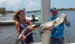 Two people fishing at New Smyrna Beach