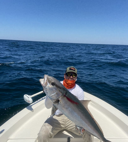Angler catching a 25-inch fish in FL