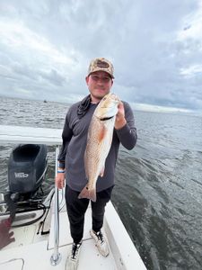 A fisherman catching a redfish in Steinhatchee