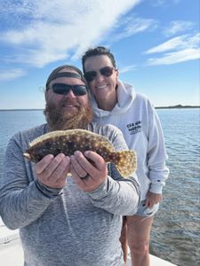 Summer flounder catch displayed on fishing boat in Steinhatchee FL waters
