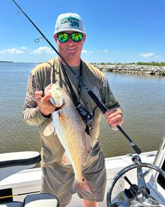 "Reeling in a trophy red drum! 