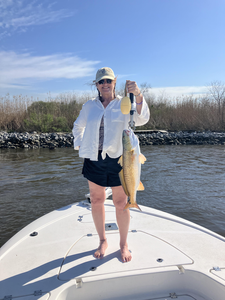 Caught a nice one on the serene lake.