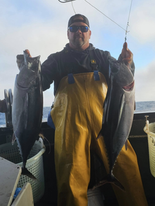 Two anglers catching big fish in Oregon