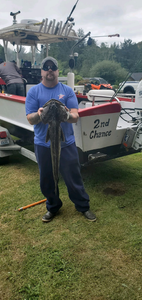 Angler with a 27-inch fish in Pacific City