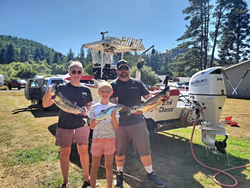 3 fishing rods with 3 fish caught in Oregon