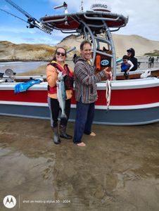 4 people fishing in the Pacific City