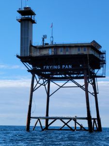Frying Pan Tower lighthouse platform standing in ocean waters off North Carolina coast