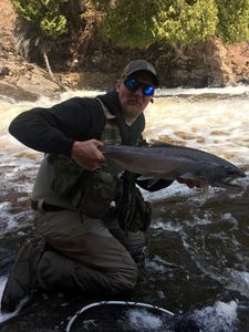 Angler with 20-inch Rainbow Trout, fishing in WI