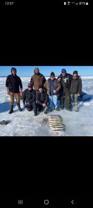 Group of 7 people fishing in Iron River