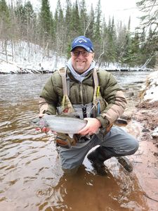 Angler fishing in Iron River