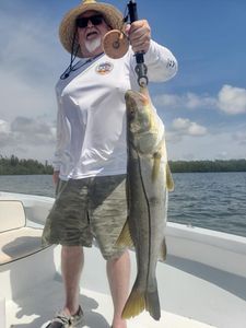A lone angler fishing in Saint James City