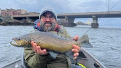 Angler with a 24-inch sea trout in NY