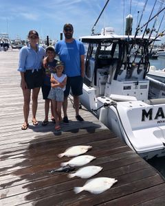 4 anglers fishing at Rehoboth Beach