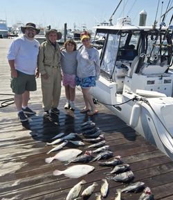 4 people fishing in DE