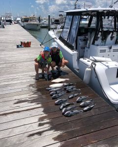 Two anglers enjoying fishing in DE