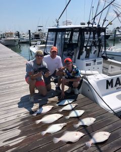 Five fishing rods and tackle at Rehoboth Beach
