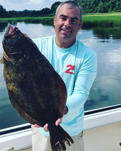 Angler with big fish caught in Keansburg
