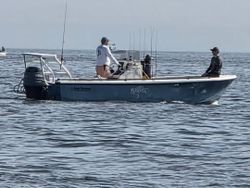 Two people enjoying a fishing trip in Keansburg